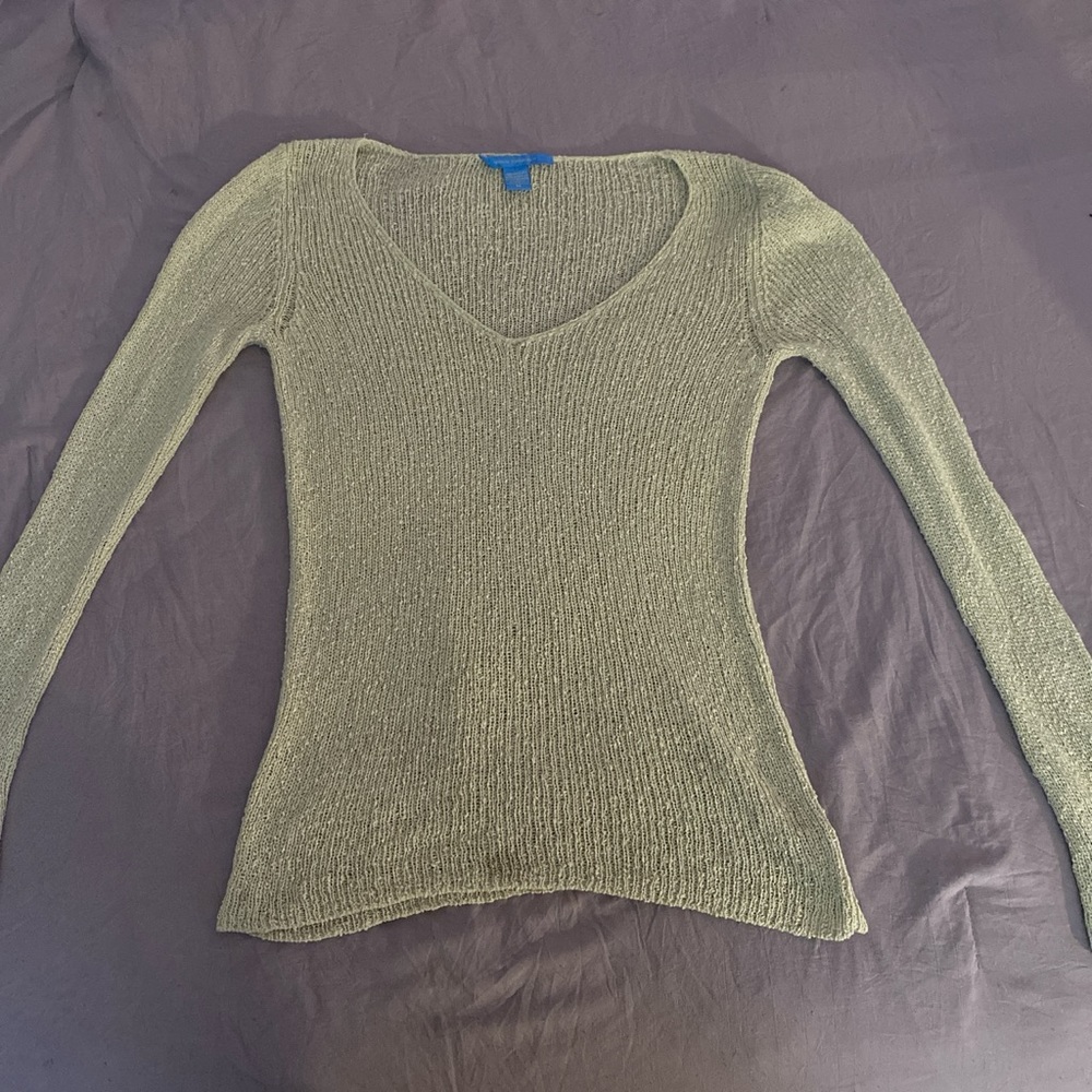 A knitted cream color, slim, long sleeve top size M